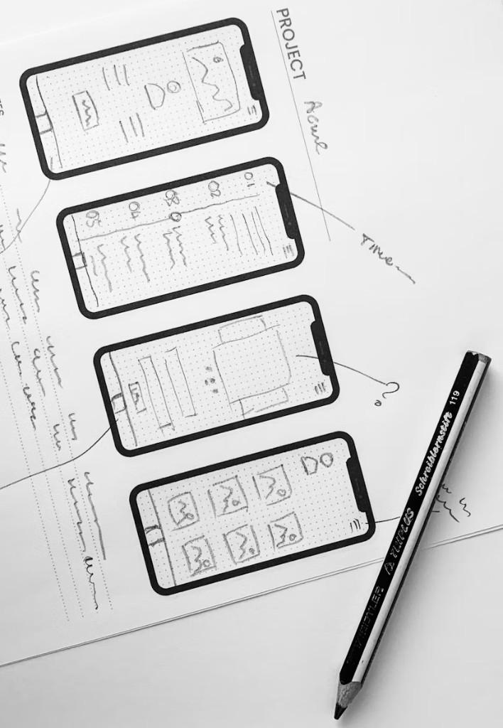 Hand-drawn mobile interface wireframes